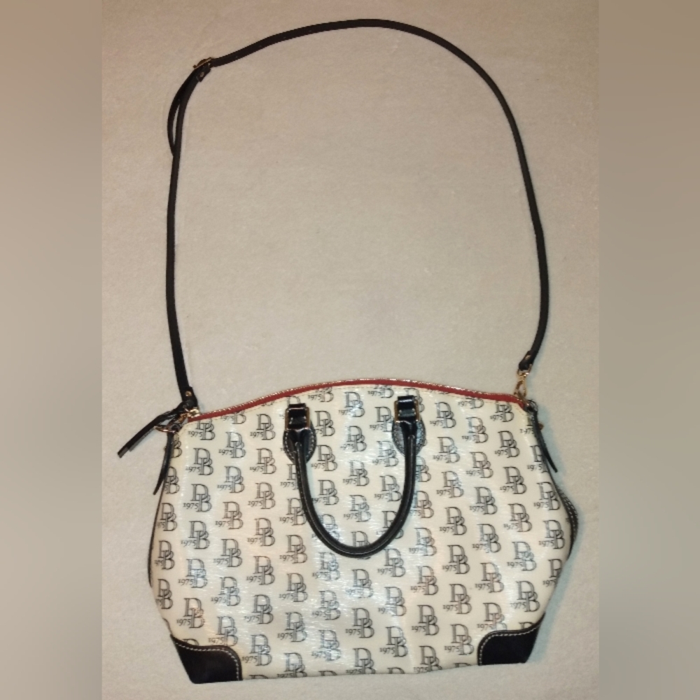 Dooney & Bourke Purse. Black and Off-White with Signature Logo.